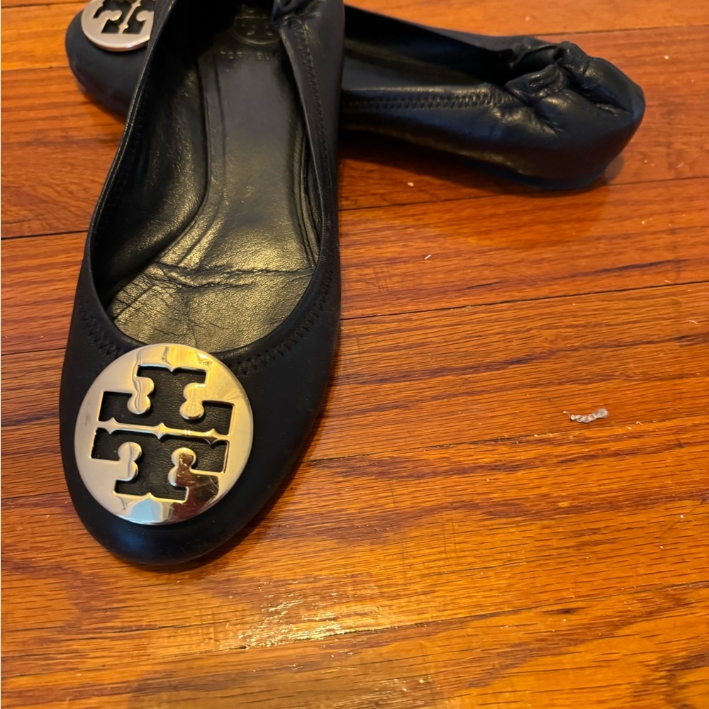 Tory Burch Slightly worn  black leather Tory Burch loafers.